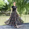 26 Nova Saia Estampada Estilo Boho Resort Europeu e Americano Primavera/Verão com Barra Larga para Mulheres