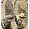 Diseño retro de otoño, pantalones casuales de pierna ancha y multibolsillos a la moda, cintura alta estilo americano, adelgazantes, corte holgado, pantalones de trabajo de pierna curva
