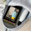 Mochila Xadrez Estilo Hong Kong Retrô para Mulheres 2025 Nova Mochila Escolar de Grande Capacidade para Alunos do Ensino Fundamental e Universitários Mochila de Viagem para Computador