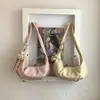 Nova bolsa feminina transfronteiriça, elegante 2026 verão nova moda bolsa de ombro crossbody de grande capacidade, versão coreana bolsa bolinho