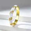 Anillo de plata Zhuo Zhifan 2024 S925 con diseño de rayas de esmalte blanco y negro de alta calidad, anillo de pareja de moda.