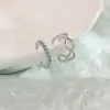 Clip para hueso lateral sin agujero en la oreja, rotación de hilo, viento frío, temperamento francés, geométrico, retro, ondulado, clip para la oreja para mujer