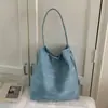 Bolso de Hombro Versátil de Gran Capacidad de Moda Transfronteriza, Nuevo Tendencia Primavera 2026, con un Aspecto de Alta Gama y Bolso Cubo de Mano
