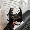 Bolso de Mano de Moda y Estilo Dumpling para Mujer, Nuevo Verano 2026 Versión Coreana Tendencia Alto Valor Color Sólido Bolso de Hombro Cruzado