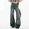 Jeans acampanados de diseño irregular desgarrado y envejecido en azul vintage, estilo nuevo de verano de cintura alta sueltos de pierna ancha para mujer