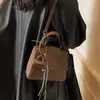 Bolso Pequeño Serie Niu para Mujer Estilo Nuevo 2025 Nicho Retro Casual Moda Versátil Bolso de Hombro Cruzado