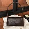 Bolso tipo baguette de nicho súper popular para otoño e invierno, nuevo estilo 2026 para mujer, moderno, para ir al trabajo, de un solo hombro, bajo el brazo, bolso de mano para exteriores