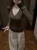 Top de punto de manga larga Pure Desire para mujer, estilo nuevo Otoño Invierno, entallado a la cintura, adelgazante, capa base, top versátil