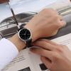 Reloj de cuarzo ultrafino de moda para hombre y mujer, correa no mecánica, resistente al agua, de alta gama para parejas, con doble escala en la correa.