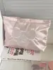 Bolsa de Cosméticos con Lazo Perlado Rosa Transfronterizo Linda Femenina Alta Calidad Gran Capacidad Bordada Satén de Seda Bolsa de Almacenamiento