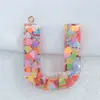 Suministro y Venta de 26 Llaveros con Letras del Alfabeto Inglés con Borlas, Accesorios para Bolsos con Lazo de Diseño Original