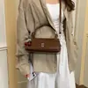 Popular bolso de mano pequeño cuadrado de un solo hombro estilo coreano 2026, nuevo bolso de nicho, bolso de mano de moda para ir al trabajo, bolso cruzado para mujer