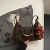 Bolsa Versátil Chique Design de Nicho Bolsa de Dumpling 2026 Inverno Nova Moda Tendência Estilo Coreano ins Estilosa Bolsa Transversal