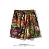 2026 Nuevos Pantalones Cortos Florales para Hombre Estilo Étnico Talla Grande Holgados Casuales Pantalones de Cinco Puntos Cordón Cintura Elástica Pantalones de Playa