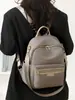 Mochila simples de nylon para mulheres, novo modelo 2026, mochila casual de moda transfronteiriça, grande capacidade, leve, adequada para o dia a dia e estudantes
