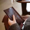 2025 Nuevo Cierre Automático Almacenamiento de Resorte Tesoro Portátil Mini Multifuncional Bolsa Pequeña para Artículos Varios Auriculares Llave