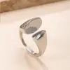 Anillos Abiertos de Acero de Titanio de Mayor Venta Europeos y Americanos para Parejas, Joyería de Anillo de Acero Inoxidable de Doble Cabeza Fundida con Diseño de Nicho