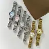 Reloj de mujer Gedi compacto estilo romano retro con correa de acero, decoración de reloj de cuarzo impermeable de alto valor de nicho