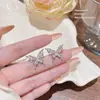 Pendientes de plata 925 con forma de aguja, de cobre y circonita, con un toque de brillo y un toque de nicho, para mujer, sencillos y exquisitos.