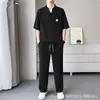 Traje casual de verano cómodo y transpirable estilo chino para hombre, conjunto versátil de dos piezas con top de manga corta de corte holgado y pantalones largos elásticos