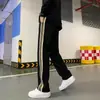 Pantalones Casuales Negros Estilo Americano para Hombre 2026 Nueva Moda Trendy para Hombre Versátil Holgado Talla Grande Estudiante Pierna Recta Pantalones Deportivos