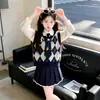 Conjunto de Chaleco Judy para Niña Primavera y Otoño 2026 Nueva Moda Camisa Infantil Conjunto de Otoño Falda Plisada para Niña Conjunto de Tres Piezas