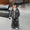 2300 Conjunto Coreano de Primavera y Otoño para Niños 2026 Nuevo Modelo Conjunto de Dos Piezas con Sudadera para Niños Ropa Casual para Bebé Niño