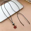 Collar con cordón de cuero de diseño estilo coreano y colgante de estrella de resina, moderno y versátil para el uso diario, perfecto como cadena para suéter o un accesorio versátil para mujeres