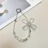 Cadena de Teléfono Móvil de Alta Gama con Trébol de Cuatro Hojas y Llavero de Cristal Incrustado con Diamantes, Estilo Correa de Muñeca Venta al por Mayor