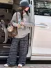 Conjunto de Ropa de Otoño para Niñas 2026 Nuevo Moda Top Elegante para Niñas Mayores y Pantalones Cargo Infantiles Conjunto de Dos Piezas para Otoño