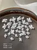 Decoraciones para uñas de flor de cristal de hielo tallada suave, modernas y versátiles, blanco translúcido, flor de cuatro pétalos tridimensional para decoración de uñas, pedrería de resina, al por mayor