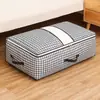 Bolsa de viaje plegable gran capacidad ropa pantalones equipaje de corta distancia bolsa de equipaje con ruedas portátil simple impermeable a prueba de polvo bolsa de almacenamiento
