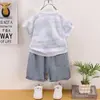 Conjunto de Verano para Niños 2026 Nuevo Elegante Estampado de Letras de Verano Manga Corta Dos Piezas para Bebés y Niños, Ropa Ligera al por Mayor