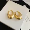 Pendientes Metálicos Ovalados Brillantes Transfronterizos Europeos y Americanos, Casuales, Simples, Personalizados, Pendientes de Moda con un Diseño Único, Accesorios para Orejas de Nicho