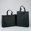 Bolsas de tela no tejida de color liso en stock, con logotipos publicitarios impresos a medida, bolsas de regalo promocionales de tela no tejida, bolsas de color liso