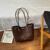 Bolso de Mano Melanoid para Viajes de Negocios para Mujer 2026 Nuevo Otoño Retro Versátil Bolso de Hombro Bolso Cubo de Gran Capacidad
