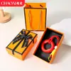 Chaveiro de anel de aperto criativo transfronteiriço para alívio de estresse, mini treinador de dedos colorido, dispositivo de aperto para alívio de estresse, pingente de mochila