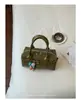 Bolso de mano de diseño de nicho nuevo para comercio transfronterizo, elegante bolso tipo bowling para el hombro y cruzado para el día a día con patrón tejido para mujer