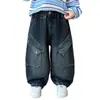 Ropa infantil pantalones de niño otoño 2026 nuevo estilo pantalones cargo de mezclilla para primavera y otoño para niños de mediana edad otoño casual pantalones largos