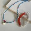 Dulce y Lindo Colgante de Vaca de Dibujos Animados Collar de Cuentas Pulsera Magnética de Cuentas Redondas Rojas y Perlas Blancas Simples y Modernas