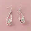 Joyería de Comercio Exterior Cobre Plateado Estilo Europeo y Americano Pendientes Colgantes de Tenis Versión Coreana en Stock Temu Xiyin Tk Venta Caliente