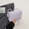 Bolso de Mano Pequeño de Nicho Transfronterizo para Mujer Primavera 2026 Nuevo Bolso Cuadrado Pequeño con Patrón Tejido Bolso de Hombro Cruzado de Moda de Alto Valor