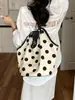 Bolso de axila de nicho de alta gama para mujer, bolso tipo cubo con estampado de lunares nuevo 2026, bolso de hombro de gran capacidad