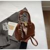 Bolsa Exquisita Super Popular para Mulheres 2025 Nova Bolsa Transversal Versátil Verão Bolsa Concha Popular Mini Pequena Bolsa Tote
