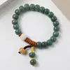 Pulseira de Raiz de Bodhi de Dunhuang com Custarda de Múltiplos Tesouros Naturais Pulseira Macia para Dedo com Envolto de Garra de Gato Pulseira Bodhi Estrela e Lua Wenwan Atacado