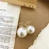 Versión coreana transfronteriza de artículo popular de Corea del Sur dulce perla para la parte posterior de la cabeza pinza para el pelo súper temperamento bola cabeza pinza fábrica de origen