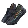 Zapatos de mujer de comercio exterior 2025 primavera y otoño zapatillas de deporte para mujer transpirables tejido fly casuales zapatos de malla ligera para correr venta al por mayor