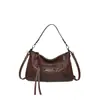 Bolso de motocicleta único para mujer, bolso de hombro y axila estilo hot girl vintage con tachuelas, nuevo bolso cruzado de moda otoño 2026