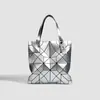 Bolso acolchado geométrico de empalme láser nuevo de Japón Bolso de mujer de color sólido a la moda Bolso de hombro con lentejuelas Tote de gran capacidad