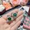 Pendientes de flor de camelia de lujo ligero, industria pesada, imitación esmeralda, chapados en oro, pendientes de mariposa de ágata verde, tesoro colorido, suministro en vivo